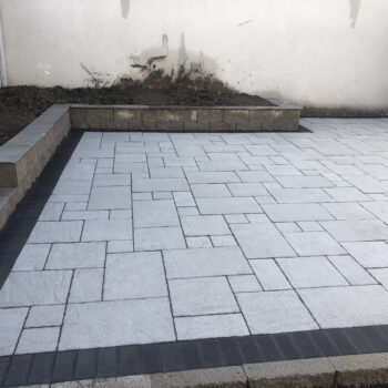 New Raised Patio Installation With Stone Walling in Carrickmines, Dublin